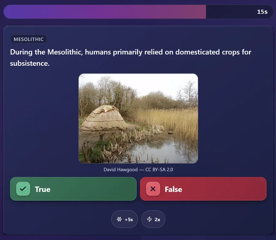 A true-or-false question tagged Mesolithic with a photograph of a reconstructed reed-thatched hut beside a river, credited to David Hawgood under CC BY-SA 2.0.